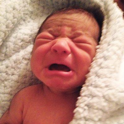 My newborn baby, Timothy crying due to the state of the entire room!