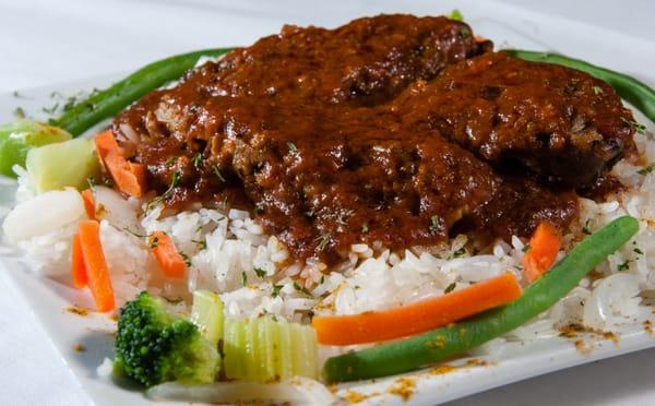 African Curry Chicken with jasmine rice and sautéed veggies