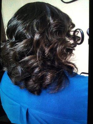 Natural hair silkened out w/ curls