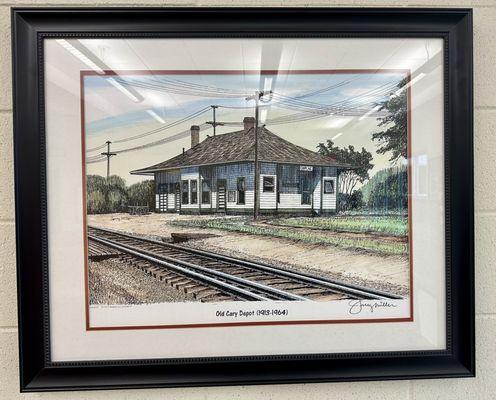 Local artist Jerry Miller's drawing of the Old Cary Depot in the current train station waiting area.