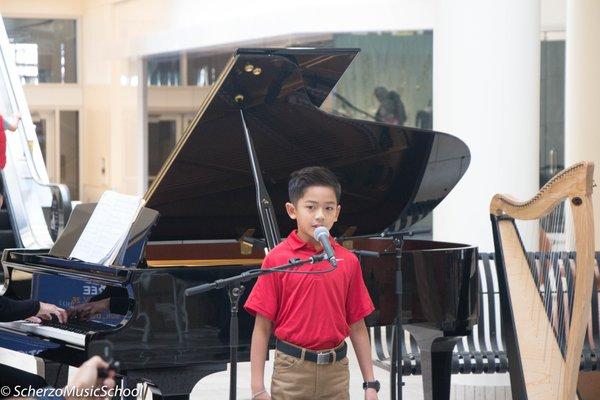 Voice student performing at Scherzo Music School Holiday Recital.