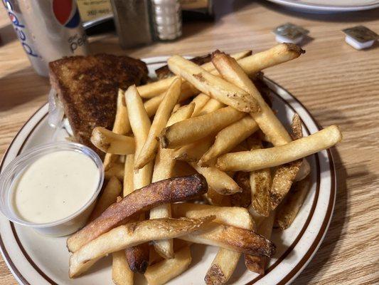 Chicken melt sandwich with fries