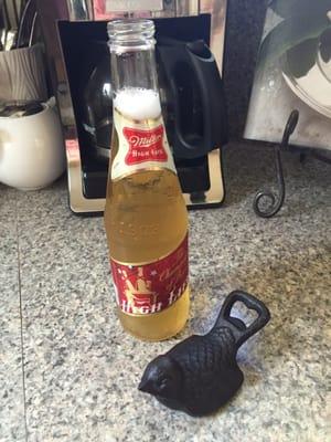 Here's the cute bottle opener. I bought it as a hostess gift and put it in with a six pack I brought to a party! Big hit.