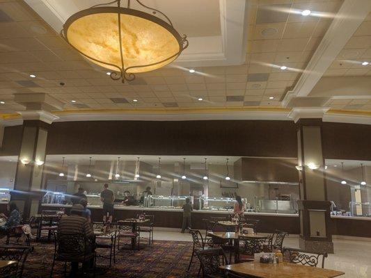 View of dining room with buffet in background toward closing time