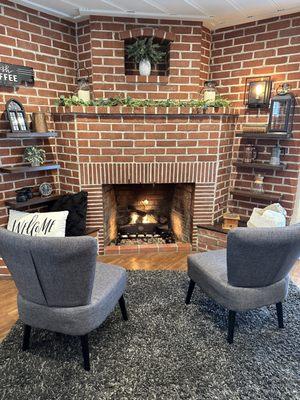 Cute little seating area with real fireplace