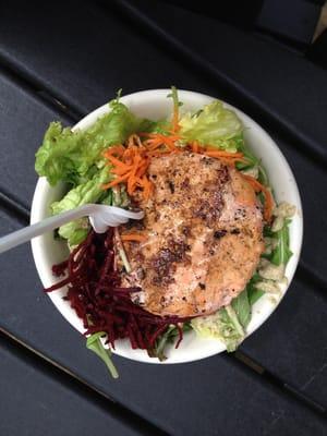 Greener salad w/ a salmon patty & tahini dressing on top. #deliciousness