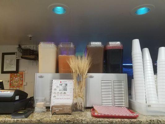 Horchata (cinnamon rice drink) and three agua frescas.