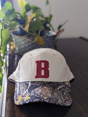 Camo hats never looked better! Come get your big "B" Blanchard Merch!