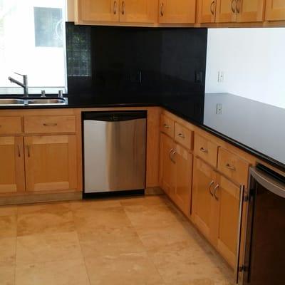 EK MARBLE clean and seal granite and travertine Sunset Beach California