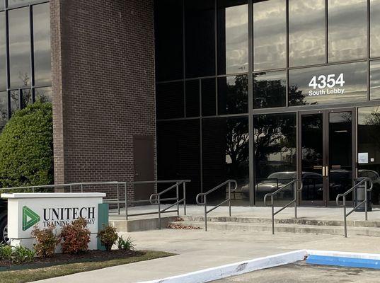 Exterior front entrance of the Baton Rouge campus of Unitech Training Academy.