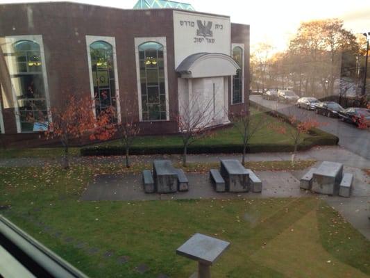 Tables in the back of the building. Photo taken from inside the dorm. :)