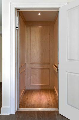 Peachtree Series home elevator design in Maple hardwood