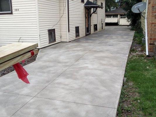 New 4000 psi driveway with a float finish and saw cut control joints