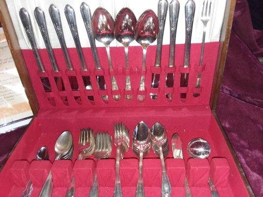 Authentic all wooden 4 piece all silver serving set.asking for.750.00 the least amount 420.00.