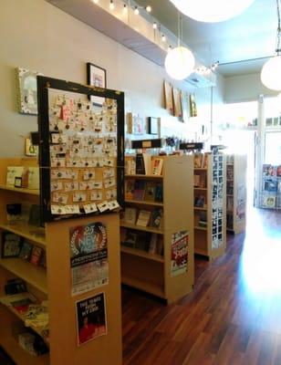 Music and book shelves at the Nearsighted Narwhal