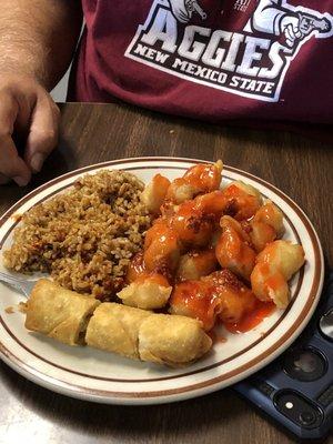 Sweet and sour pork, fried rice and egg roll.