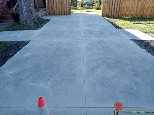 4500 psi concrete driveway with float finish and saw cut control joints