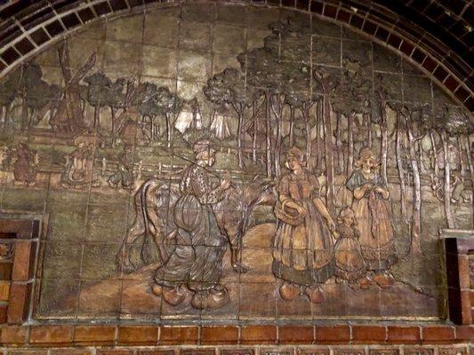 Batchelder tile frieze in rear section beneath groin vault