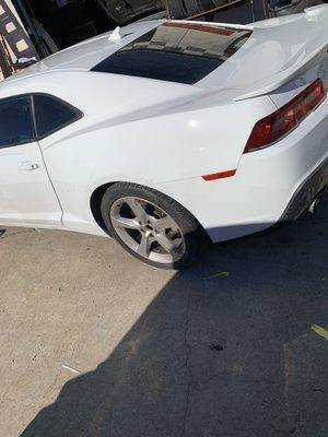 Camaro getting reassembled for delivery.