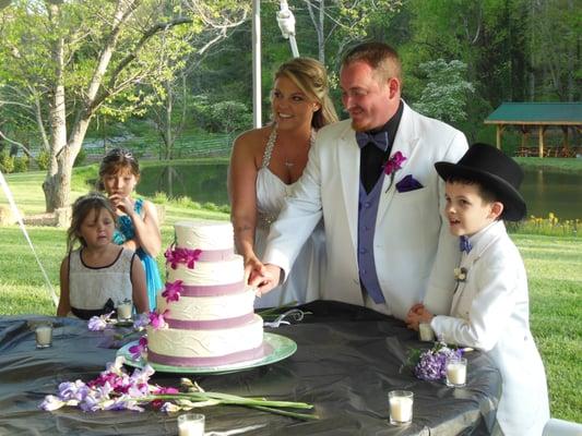 Beautiful wedding party compliments Cloud 9's Event Area by the pond and waterfall.