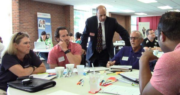 Business Coach Mark McNulty with a few of his clients.