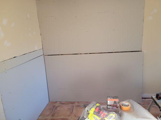 Took out door way and drywalled around it