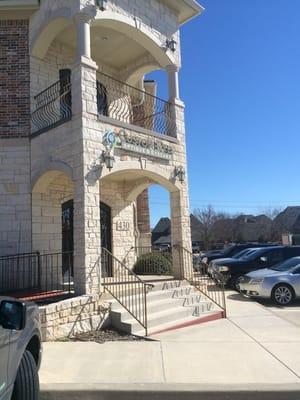 Front entrance. The location is in the back building of the complex.