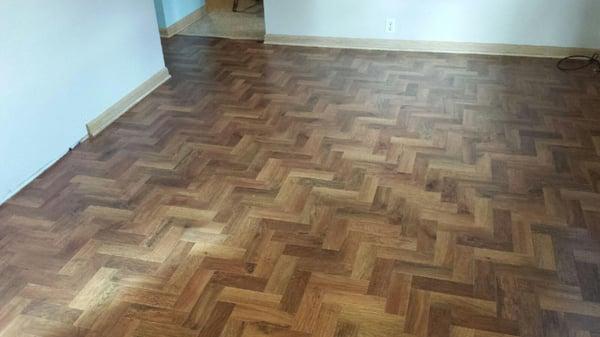 Luxury Vinyl Plank installed in a herringbone pattern.