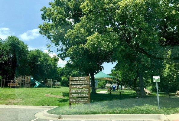 Playground, picnic shelter, and tennis courts here; dog friendly (must be on leash and under your control at all times).