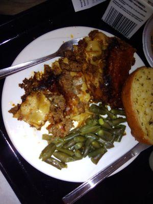 BURNT, DRY LASAGNA! WITH ONLY HAMBURGER AND SHARP CHEESE ON TOP WITH COLD GREEN BEANS