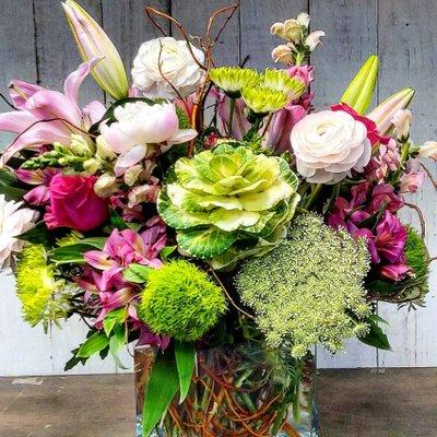 Gorgeous hand arranged flower arrangements and hand delivered with flower delivery to houston tx