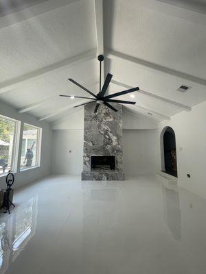 Here's a custom one of a kind chimney with an all white floor