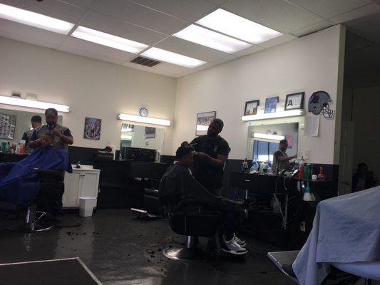 Barbers doing their thing!