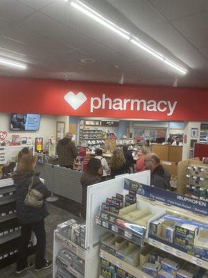 A line at the pharmacy moving no where.