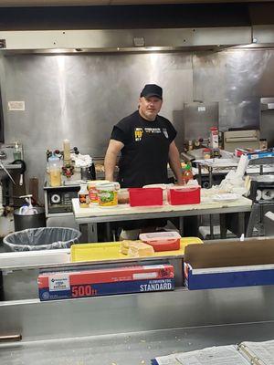 Charlie making sandwiches