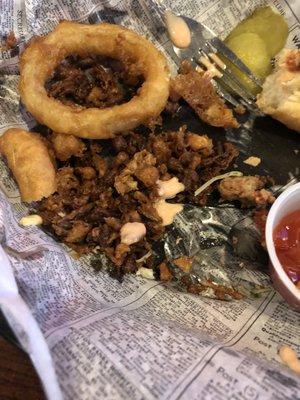 They dropped all the left over's from the Fryer basket in with the onion rings ..