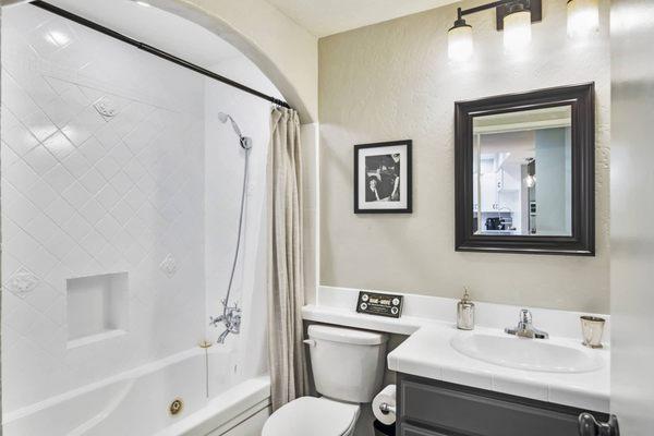 This was Glenn's vision to help in selling our condo. Updated cabinet and counter top. We also reglazed the shower. Also excellent staging.