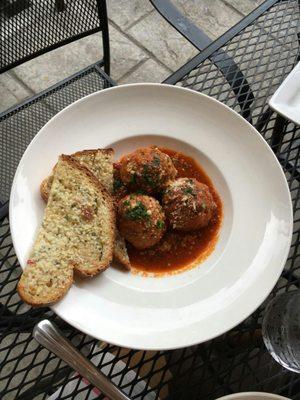 Meatballs with garlic bread.