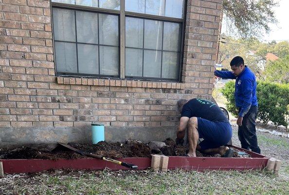 Owner doing the work while Will Fix it guy watches.