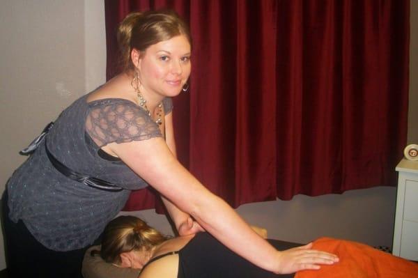 Chelsea Giles showing one of her massage techniques.