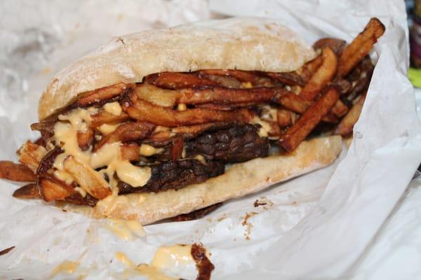 The veggie. It's just a ton of Field Roast veggie deli slices, french fries, and cheese sauce. What is the point? Would not recommend.