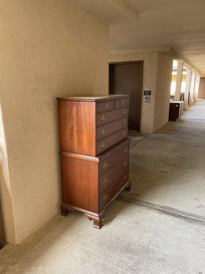 Furniture Left in the Hall by Maintenance After Evicting a Deceased Neighbor