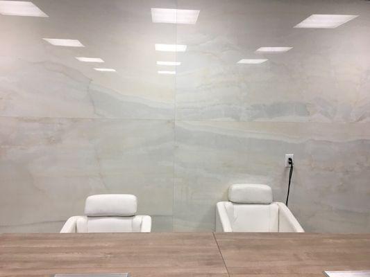 Porcelain slabs showcased  throughout the showroom walls create inspiration for any design project.