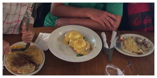 This photo doesn't do the food justice. French toast, eggs florentine (perfect yolks), eggs frittata, & loaded omlette w/crab.