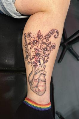 Heart tattoo with plants