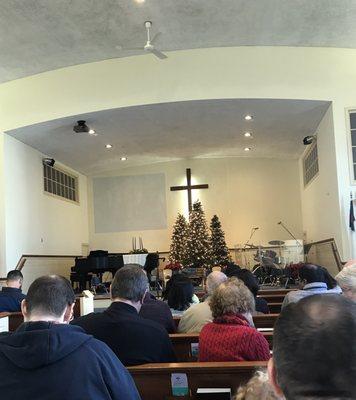 The altar of The Wethersfield Evangelical Free  Church decorated for Christmas.