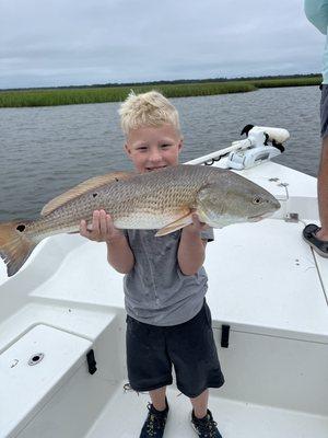 Grandson Collin catching his first "Red" With Christian at the helm we had a great day!