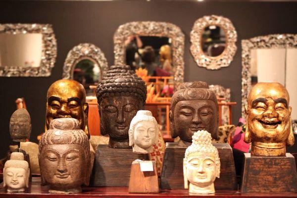 What a beautiful array of Chinese Buddha heads.. with selection of Thai hand cut mirrors in the backdrop.