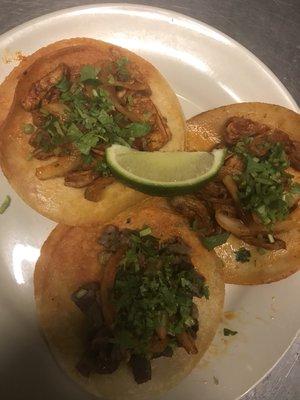 Fried pork tacos with cilantro and fried onions