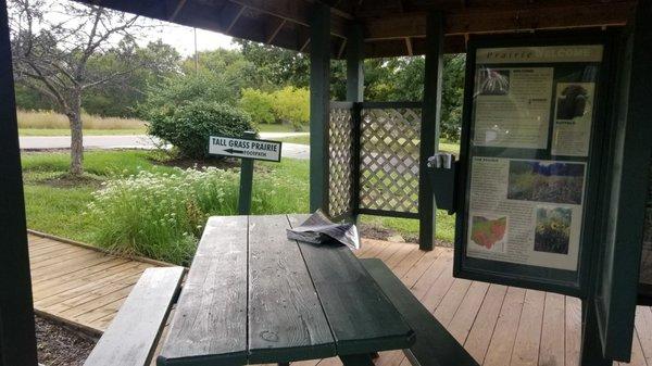 Info boards of plants, birds and animals in the field across the road